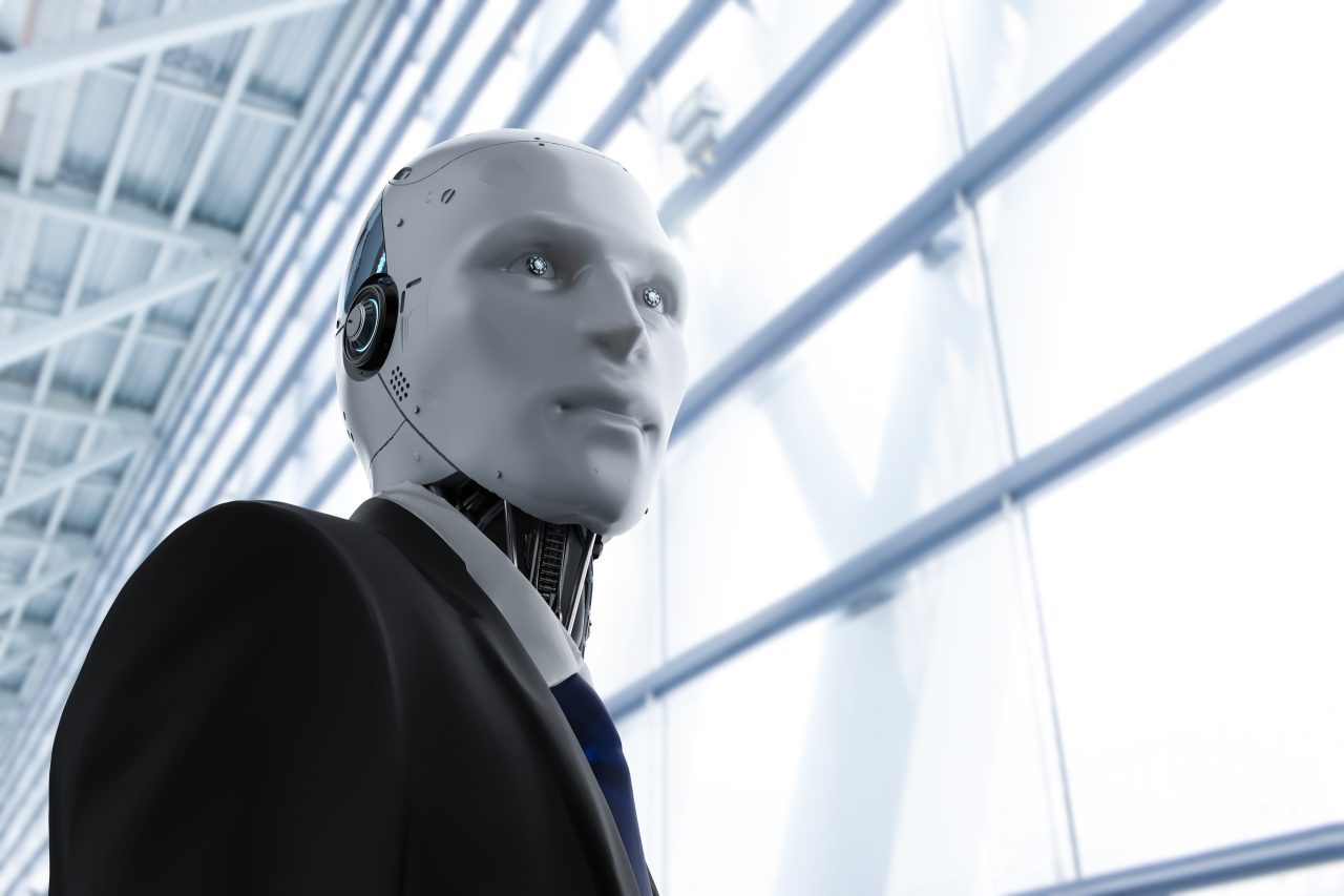 Robotic businessman wearing suit in an office