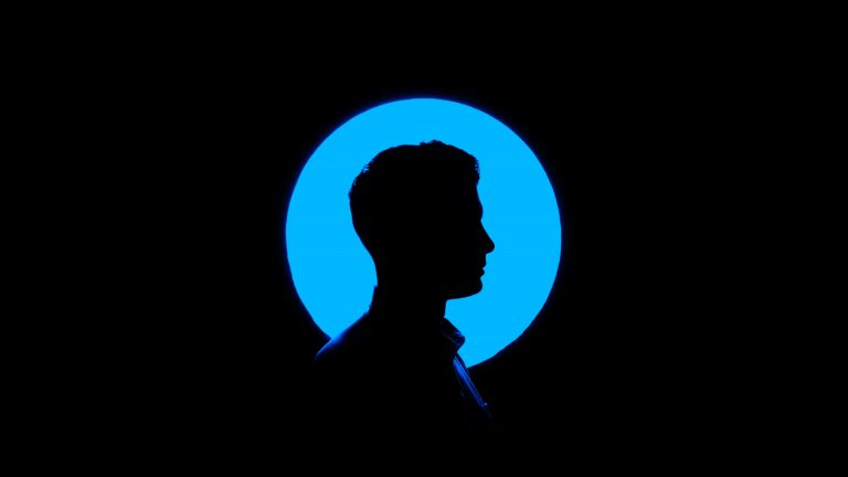profile headshot on blue