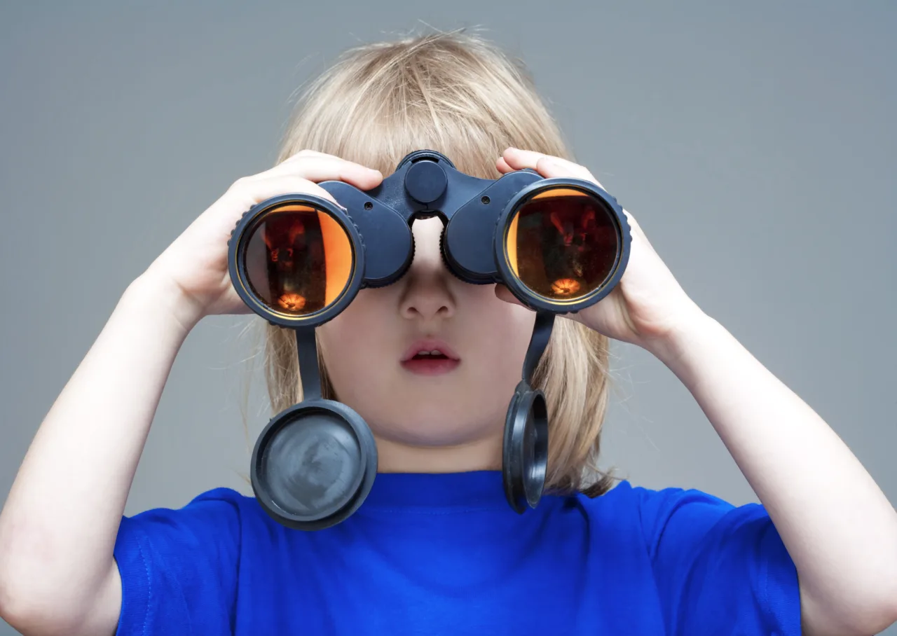 Boy with binoculars